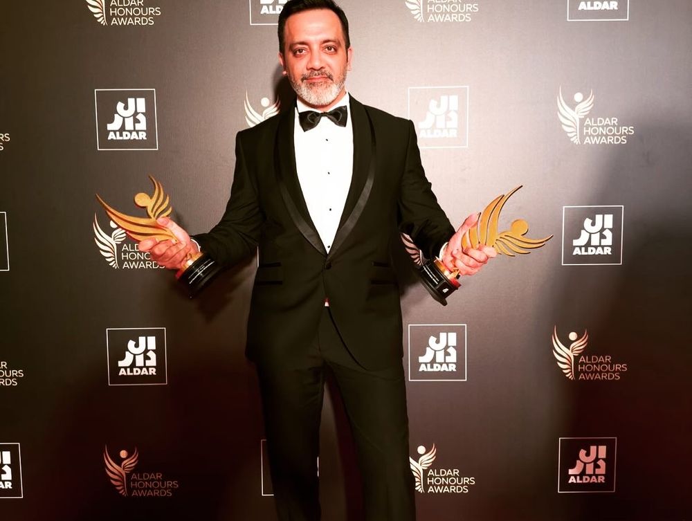 Bimal Lulla with two Aldar Honours trophies